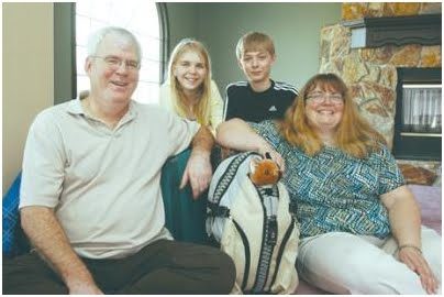 Raymond Smith, his wife Sheila Doran-Smith and their children Bethany, 14, and Dylan, 12, had their bags packed Monday to start their trip to Tanzania.