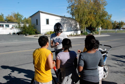 Young people offering batteries
